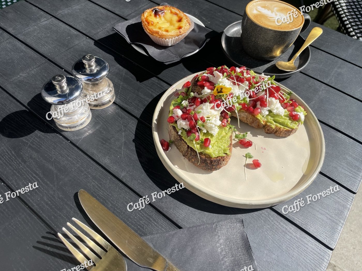 Avocado toast, plated on the terrace table