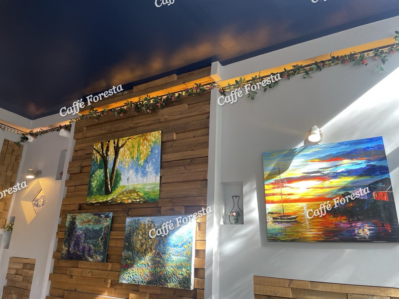 Pendant lights and paintings on the wall