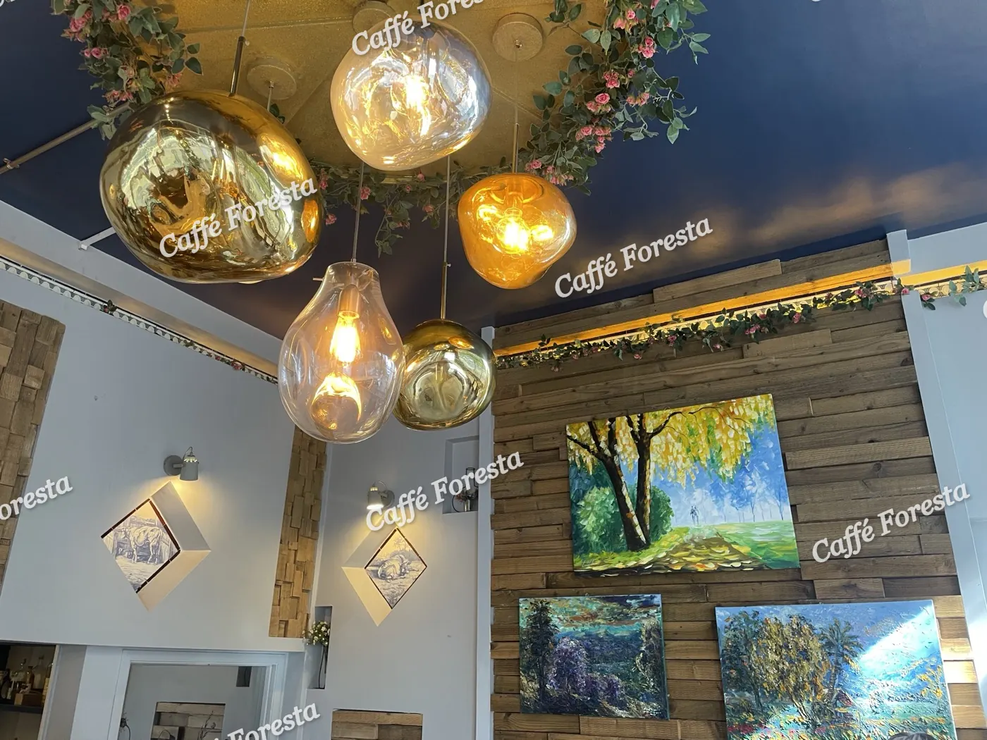Pendant lights over the gallery wall